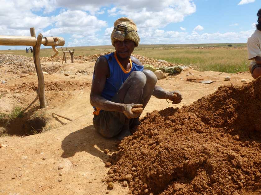 artisanal-gem-mining2 Artisanal miner working a secondary deposit. (Photo courtesy of Swarovski.)